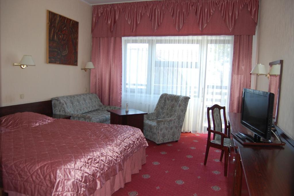 Hotel Wodnik Łeba Rum bild